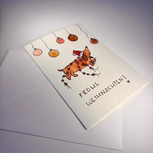 Weihnachten - Dackel mit Weihnachtskugeln