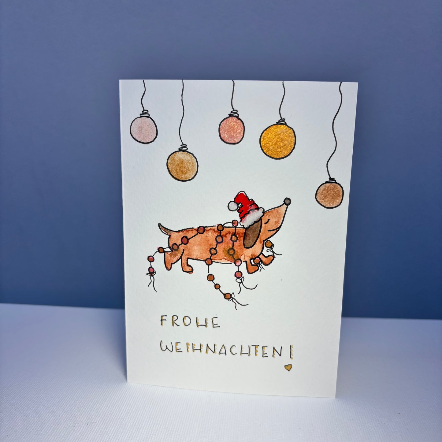 Weihnachten - Dackel mit Weihnachtskugeln