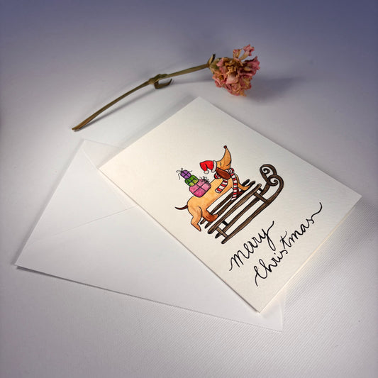 Weihnachten - Dackel auf Schlitten